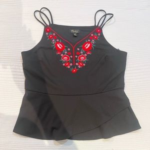 Embroidered peplum top